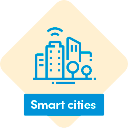 A diamond shaped icon with showing the phrase Smart Cities, with a line drawing of a small city with signal waves apearing from the tops of the buildings