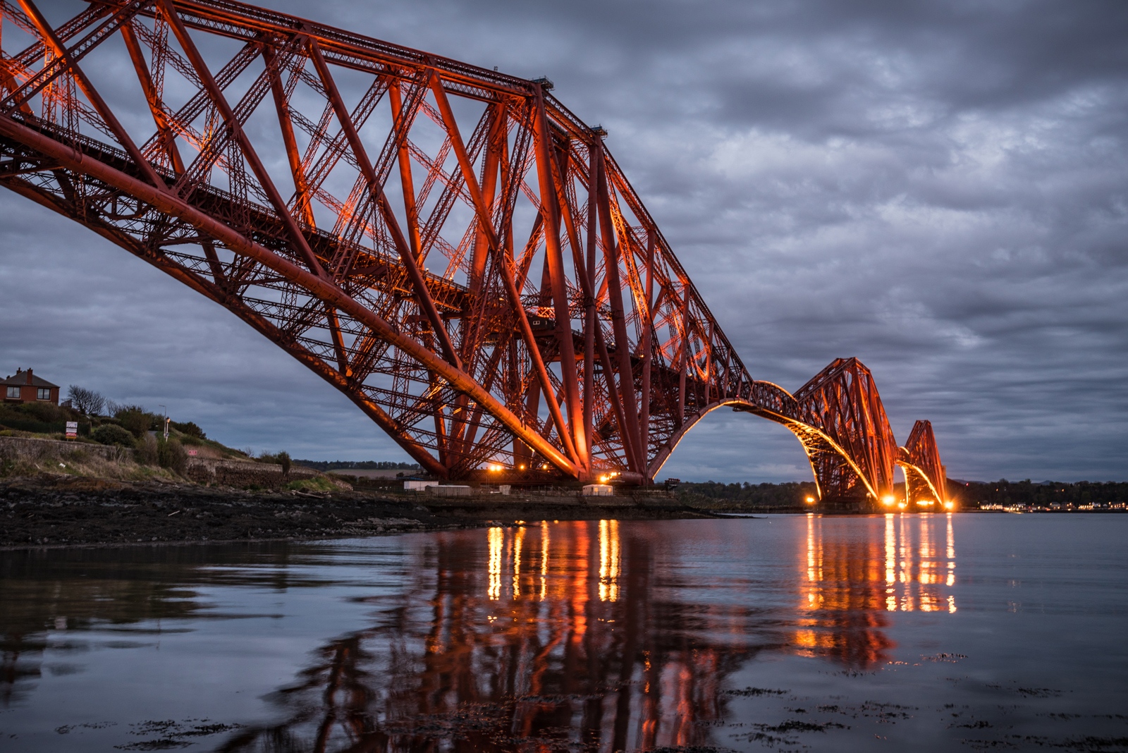 The Forth Rail Bridge photographed at night, from the water
